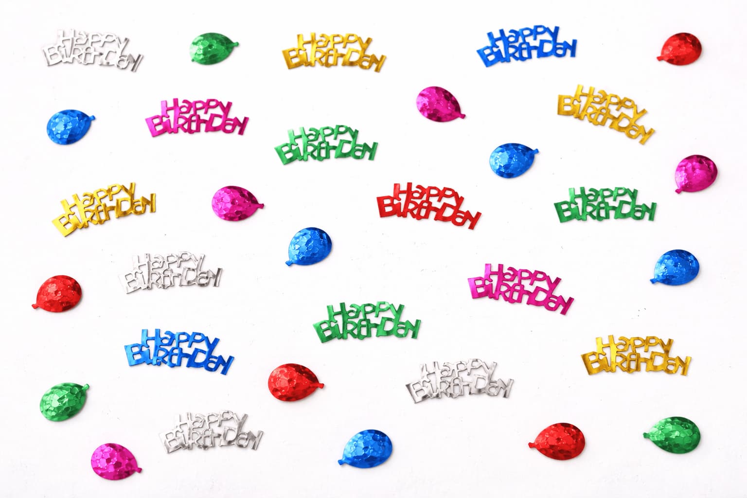 Birthday confetti evenly scattered on table showing simple and easy setup