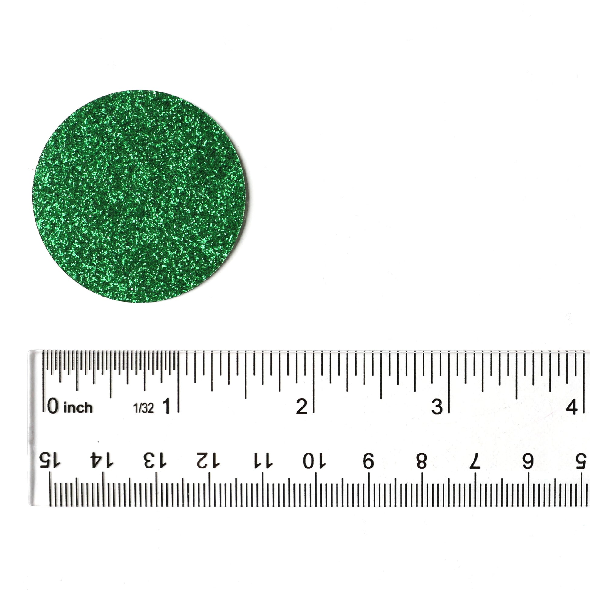 Luxe green circle confetti displayed on a white background next to a ruler
