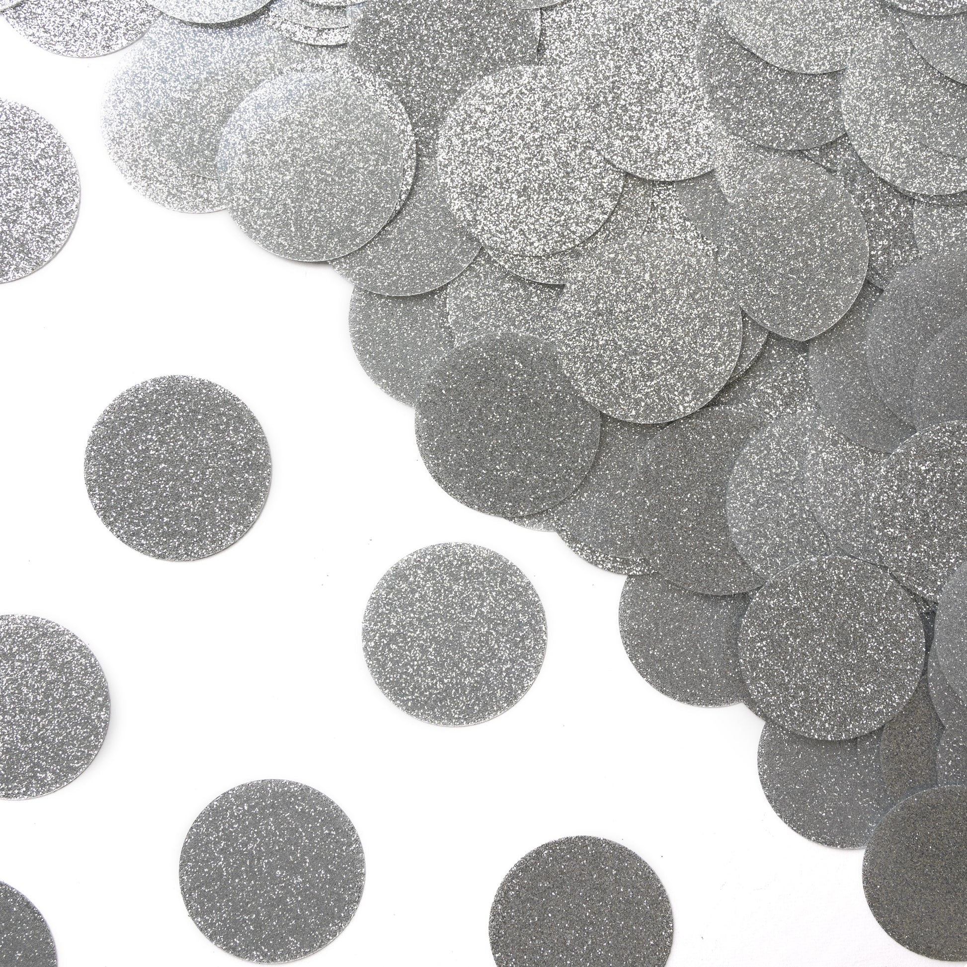 Luxe silver metallic confetti dots arranged in a scattered mixed display on a white background