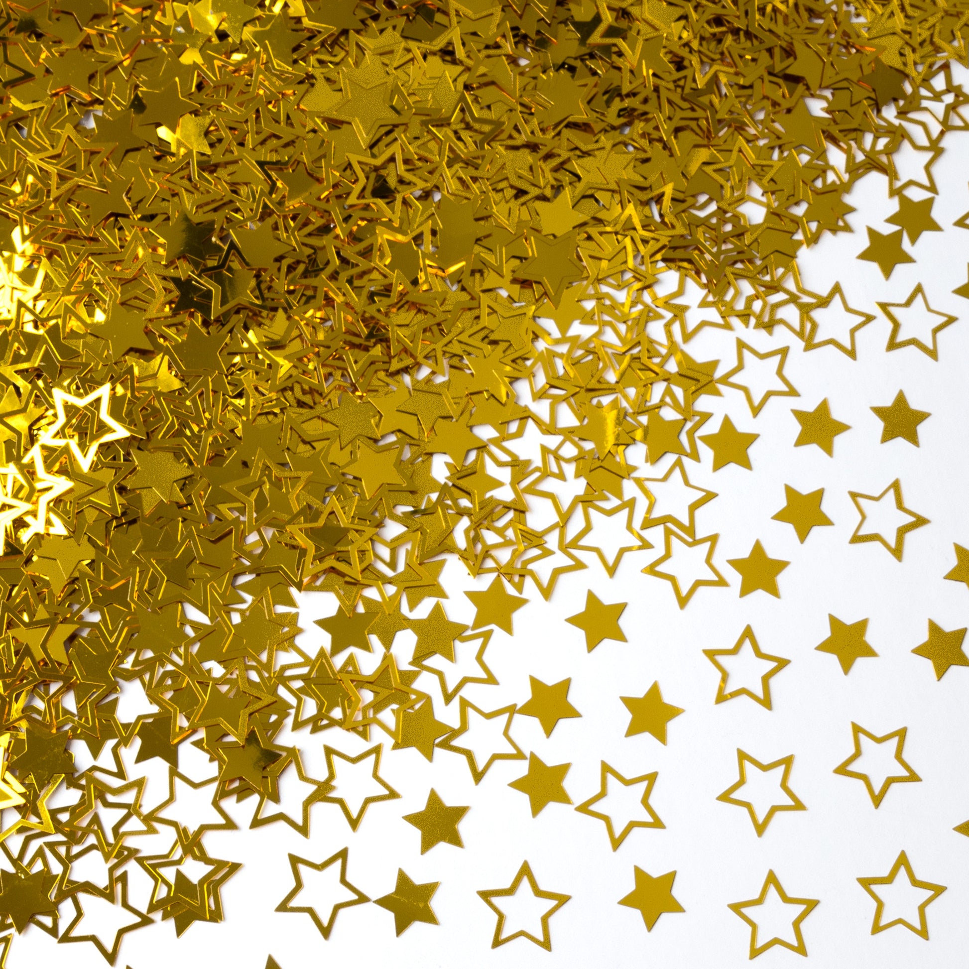 Metallic gold star-shaped confetti scattered on a white background