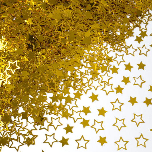 Metallic gold star-shaped confetti scattered on a white background