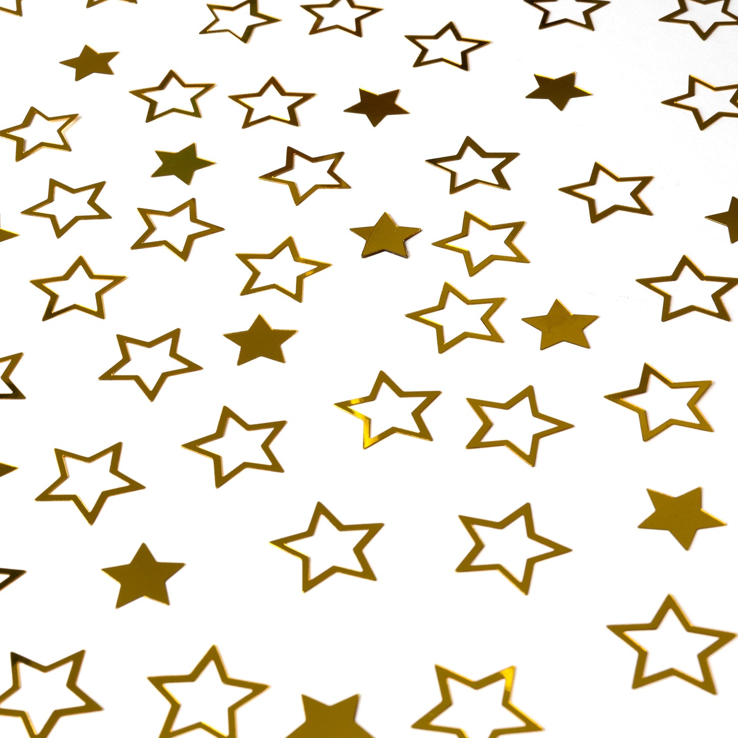 Metallic gold star-shaped confetti arranged in a repeating pattern on a white background