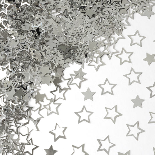 Metallic silver star confetti in hollow and solid shapes spread across a white background